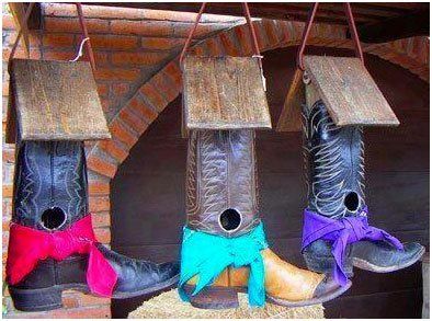 Old Cow boy boots converted into a bird house